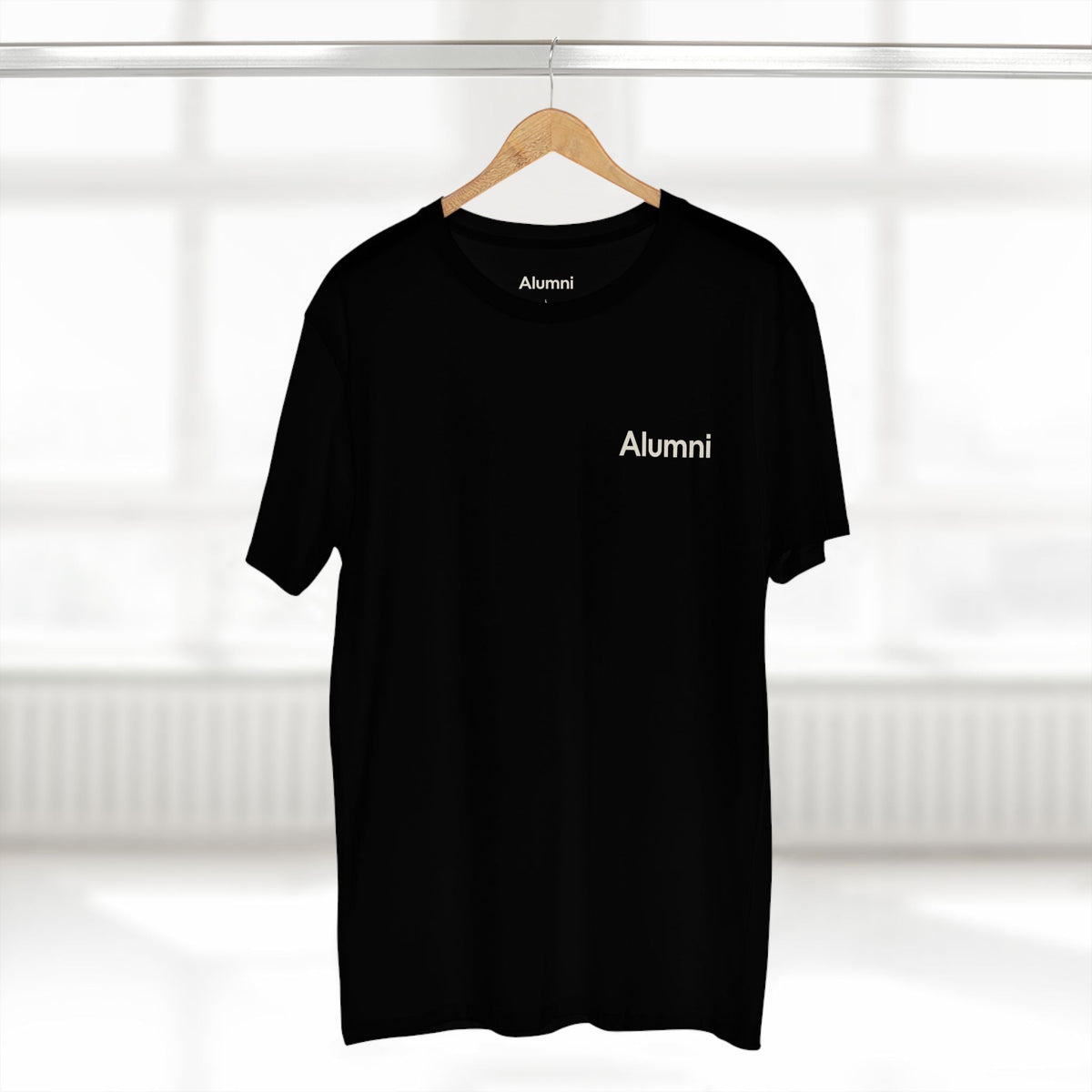 Alumni Supporters Club wordmark tee in black on a hanger