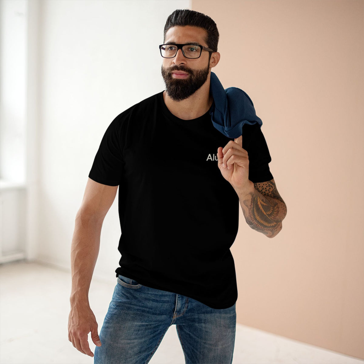Alumni Supporters Club wordmark tee in black worn by a model